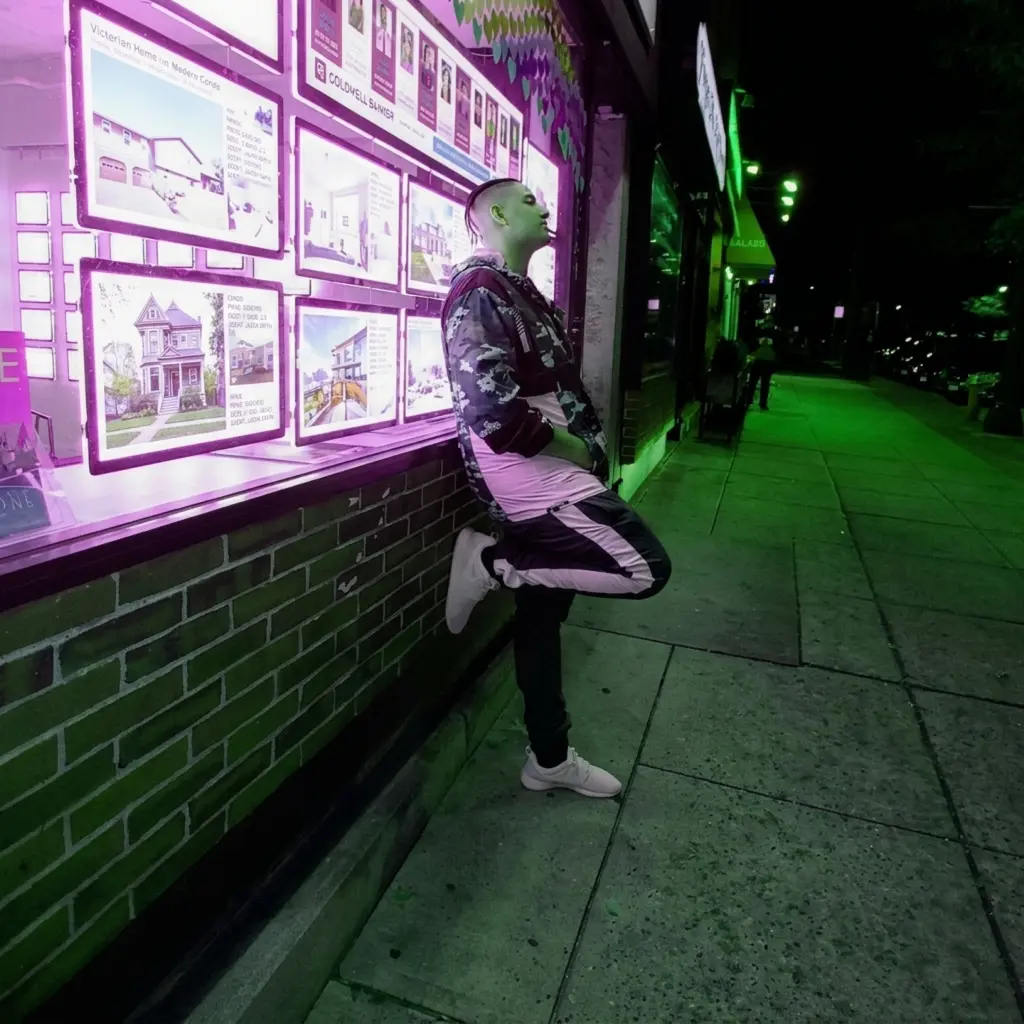 AlexOnGame92 under neon purple and green street lights